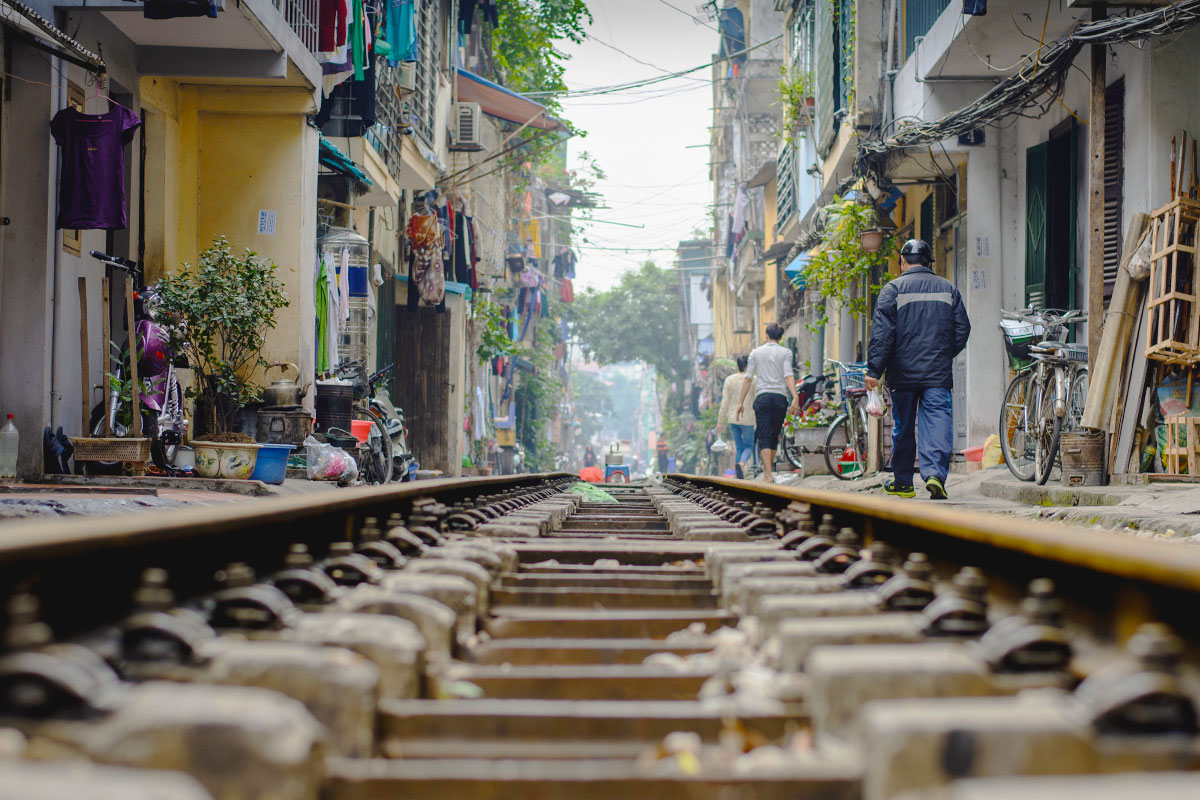 Captivating life amongst Train Street of Hanoi, where locals people eat, sleep and live along the railway