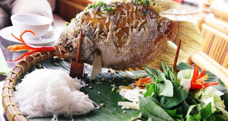 Crispy fried fish with vermicelli, herbs and sweetened fish sauce