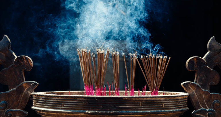 The use of incense sticks at ancient pagoda in Hue, Vietnam (Photo by Sens Asia)
